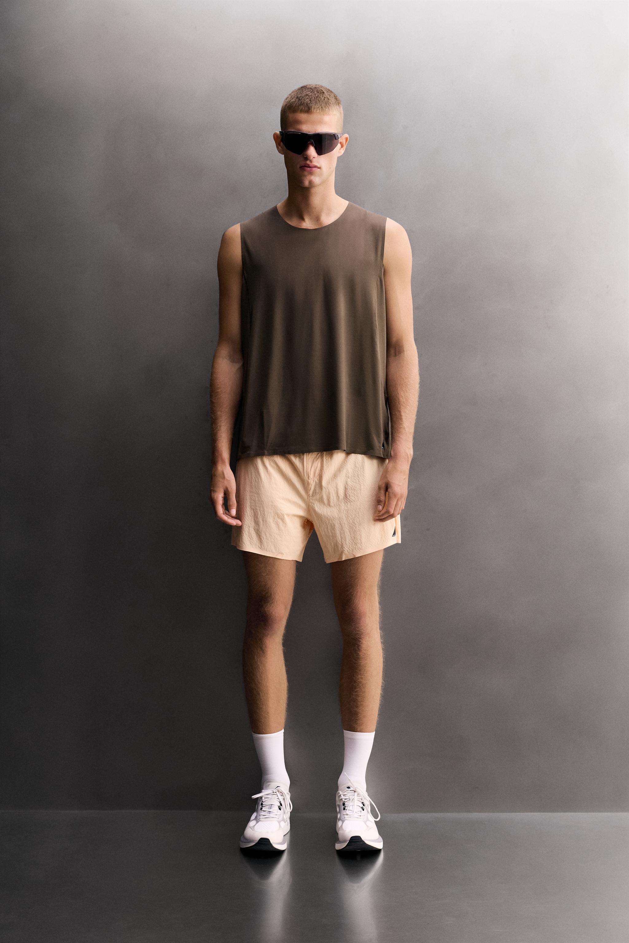 GRAPHIC RUNNING TANK TOP